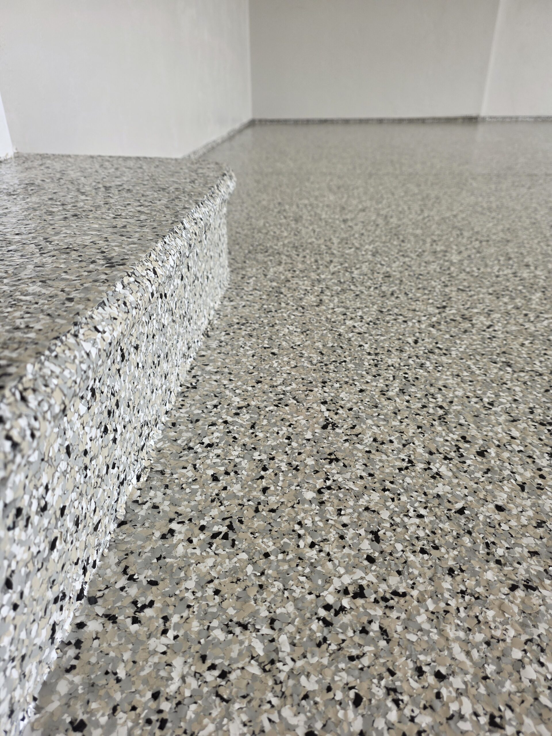 Polzin Epoxy Designs | The Long-Term Cost Savings of Coating Your Concrete Before Winter